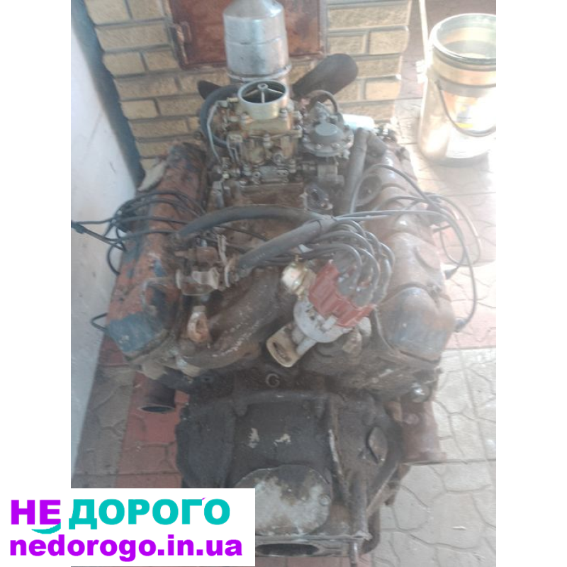 Двигун ГАЗ-53 з коробкою передач, випущений в Україні за стандартами Merchant Google. Назва: ГАЗ-53, модель: -, рік випуску: -, об'єм двигуна: 4,25 л, паливо: бензин.
