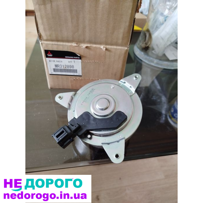 Двигун вентил. системи охолодження, лівий MR312898 Mitsubishi, оригінал, укр., модель MR312898, рік випуску невідомий, об'єм двигуна паливо.