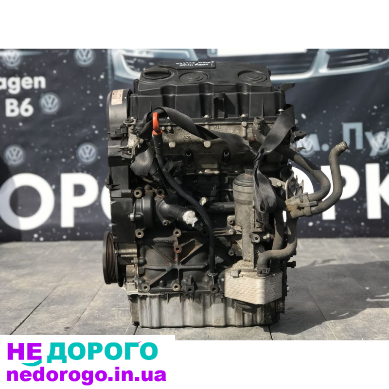 Мотор двигун 1.9 BLS 77кВт Passat B6 Golf 5 Skoda A5 Touran Caddy 2005-2010 дизель.