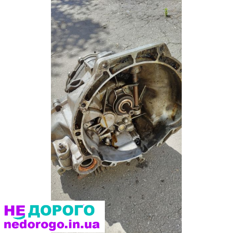 Коробка передач Ford 87TT-7F096-AB для автомобіля Ford, випущена в 1987 році, об'єм двигуна - 2.0 літра, працює на бензині.