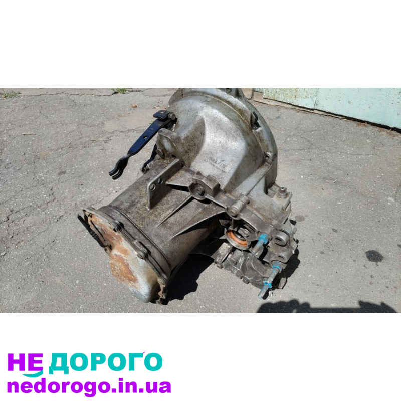 Коробка передач Ford 87TT-7F096-AB для автомобіля Ford, випущена в 1987 році, об'єм двигуна - 2.0 літра, працює на бензині.