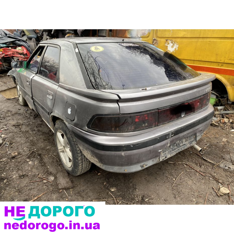 Мотор 1.6 інжектор Mazda 323 BG, об'єм двигуна 1.6 л, бензин, рік випуску не вказано.